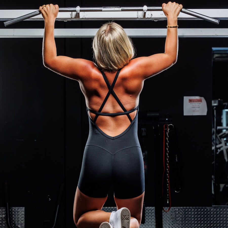 Alexia Wilson performing a pull-up
